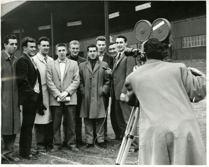 The Dundee players were in demand before the match against Raith Rovers at Dens Park.