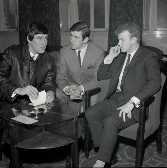Jim Baxter, John Greig and Billy Bremner are pictured at the North British Hotel, central Glasgow, before travelling south to Wembley in 1967.