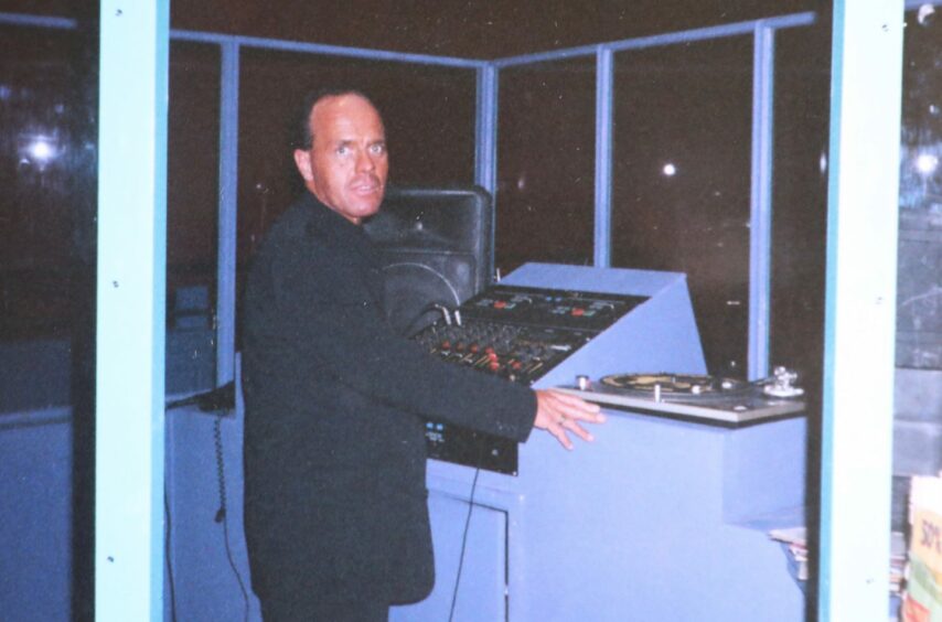 DJ Hot Ice behind the decks in the '80s.