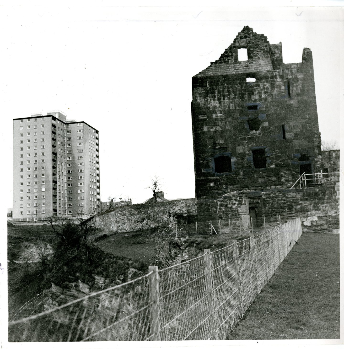 The ruined Ravenscraig Castle, Kirkcaldy, with the Ravenscraig multi-storey flats in the background in 1975.