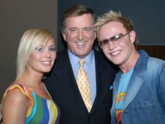 UK pop group Jemini – Jemma Abbey and Chris Crosbey – pictured with Terry Wogan in 2003, ahead of coming last at the Eurovision Song Contest (PA)