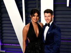 Priyanka Chopra and Nick Jonas have shared the first photo of their baby daughter (Ian West/PA)
