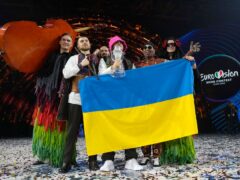 The Kalush Orchestra from Ukraine celebrate after winning the Eurovision Song Contest in Turin on May 14 (Luca Bruno/AP)