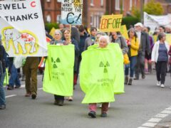 Protesters marching from Leiston to Sizewell in Suffolk to oppose the building of the Sizewell C nuclear power station (Gregg Brown/PA)