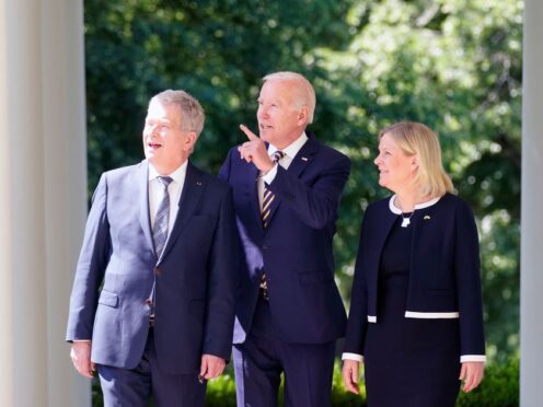 President Joe Biden accompanied by Swedish Prime Minister Magdalena Andersson and Finnish President Sauli Niinisto walks out to speak in the Rose Garden of the White House (Andrew Harnik/AP)
