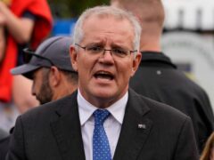 Polling stations opened across Australia on Saturday for voters to decide whether Prime Minister Scott Morrison’s conservative government will defy odds and rule for a fourth three-year term. (Mark Baker/AP)