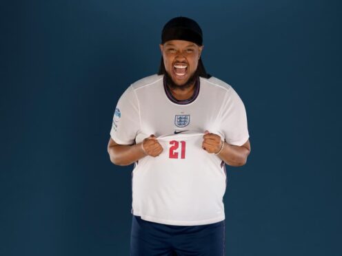Chunkz poses in a Soccer Aid football kit (Unicef/Soccer Aid Productions/Stella Pictures/PA)