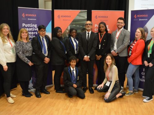 George Dixon Academy staff and students with members of the 4Schools team (Channel 4/PA)