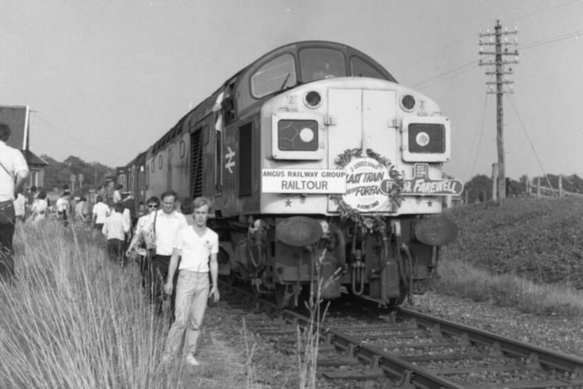 Tom Mahoney's picture from June 5 1982 shows the crowds gathering beside the tracks at Burrelton.