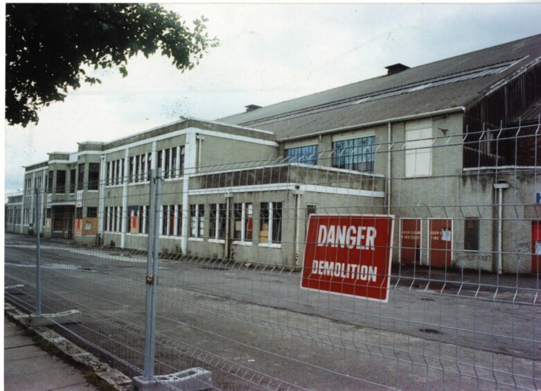 The Dundee Ice Rink surrounded by fencing as demolition is about to take place in 1990.