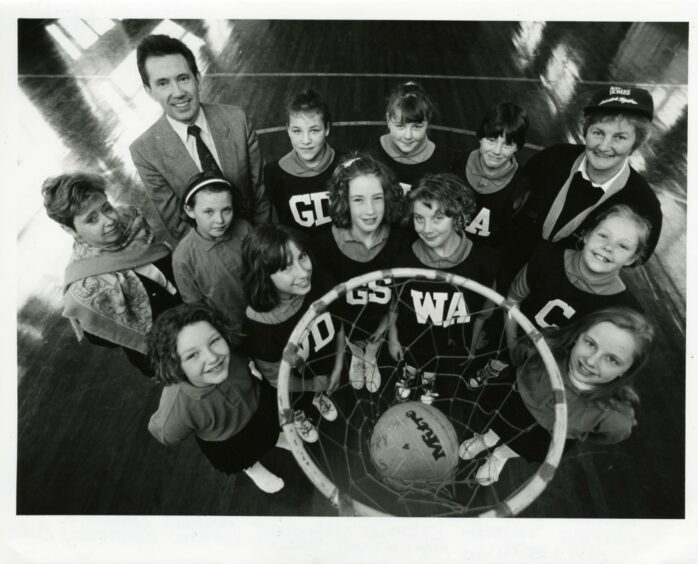 Miss Davidson is pictured alongside the Fintry PS netball team in 1991.