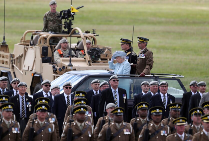 Queen Elizabeth II , Colonel-in-Chief Royal Scots Dragoon Guards (Carabiniers and Greys), arriving to present a new standard to the regiment at Leuchars Station in Fife