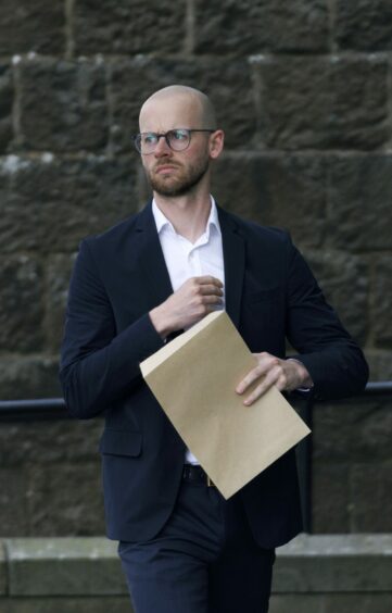 Lewis Proctor arrives at Perth Sheriff Court