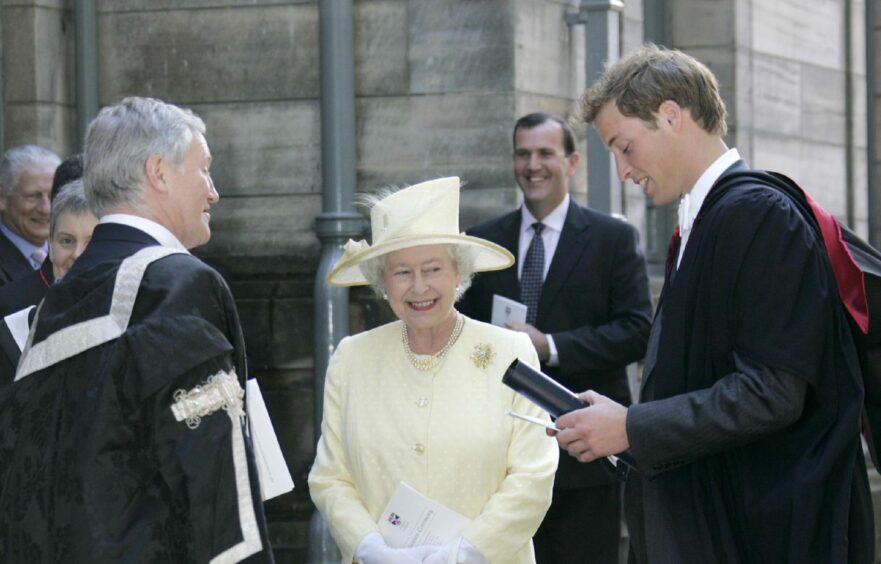 Queen Elizabeth II stands with Prince William after his graduation ceremony at St Andrews