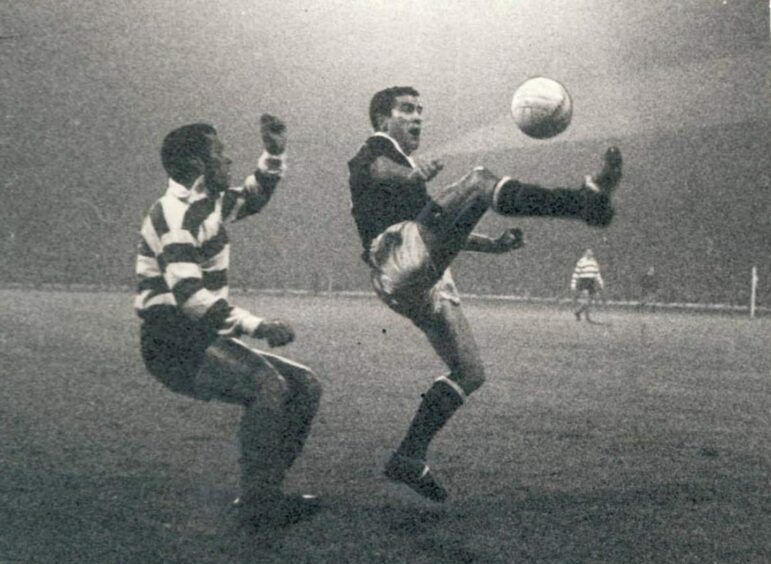 Hugh Robertson brings down a high ball during the second leg against Sporting Lisbon.
