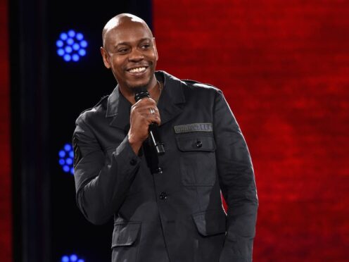 The man accused of attacking Dave Chappelle on stage at the Hollywood Bowl has been charged with four counts of misdemeanour (Lester Cohen/Netflix)