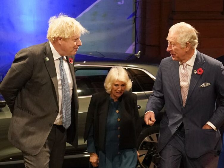 Boris Johnson greets the Prince of Wales (PA)