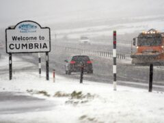 Drivers negotiate blizzards, snow and high winds on the A66 between Scotch Corner and Penrith, the most sparsely populated place in England (PA)