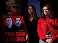 The family of Dom Phillips, from left: Helen Davies, Rhianna Davies and Domonique Davies at a vigil outside the Brazilian Embassy in London (PA)