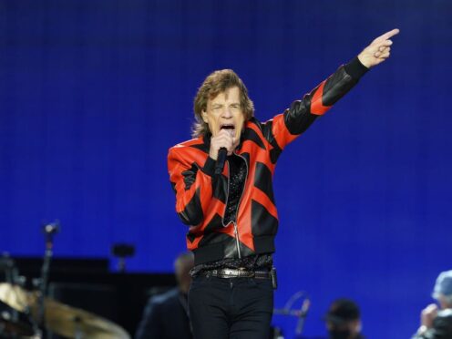 Mick Jagger performs on stage at Anfield (Peter Byrne/PA)