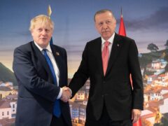 Prime Minister Boris Johnson greets President Recep Tayyip Erdogan of Turkey ahead of a meeting during the Nato summit in Madrid, Spain (Stefan Rousseau/PA)