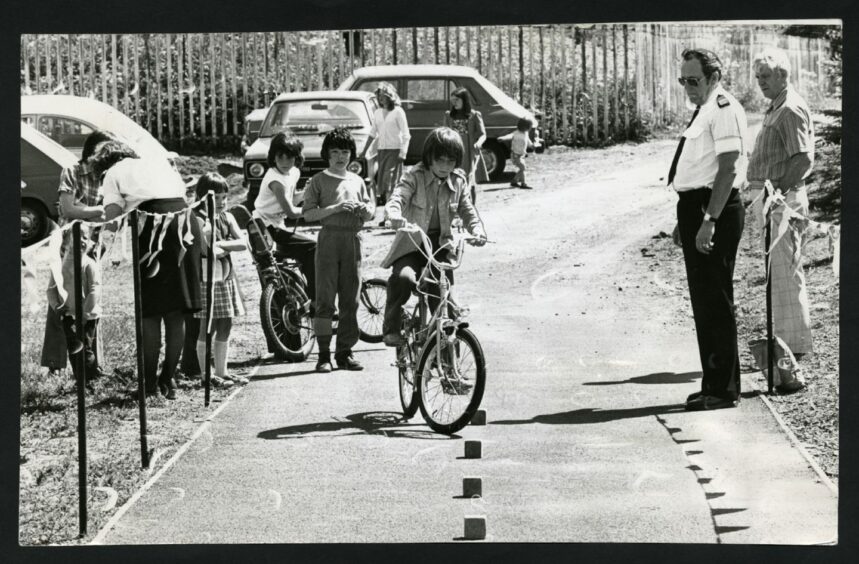 Police put youngsters through a road safety test at Linlathen Gala in 1978.