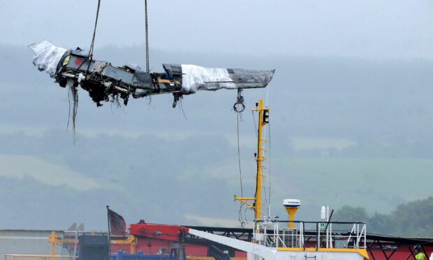 Wreckage and debris from the RAF Tornado collision in the Moray Firth being returned to Invergordon.