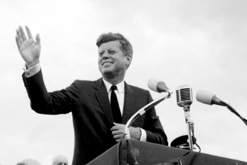 US President John F. Kennedy acknowledging the cheers of the crowd when he visits Ireland in 1963.