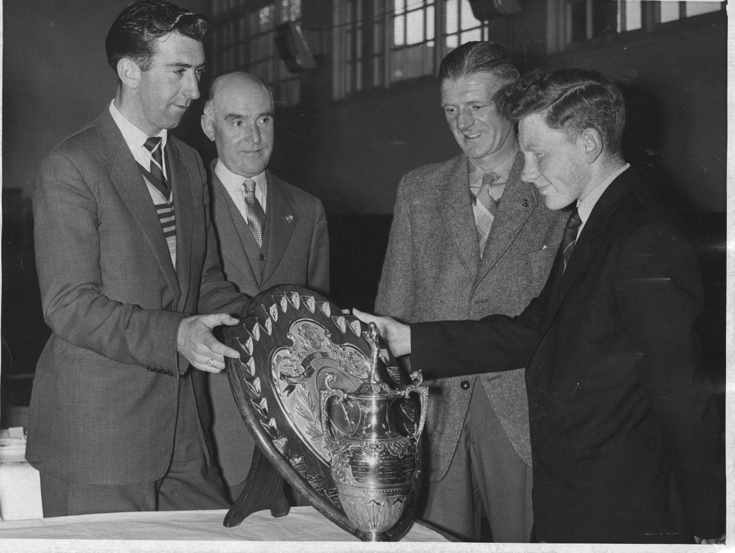 George Kelly presented Boys Brigade football trophies at the Aberdeen Battalion headquarters in 1958.