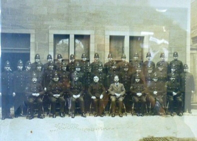 Dundee Burgh police outside their original premises on West Bell Street. Supplied by Iain Flett. Late 1800s.
