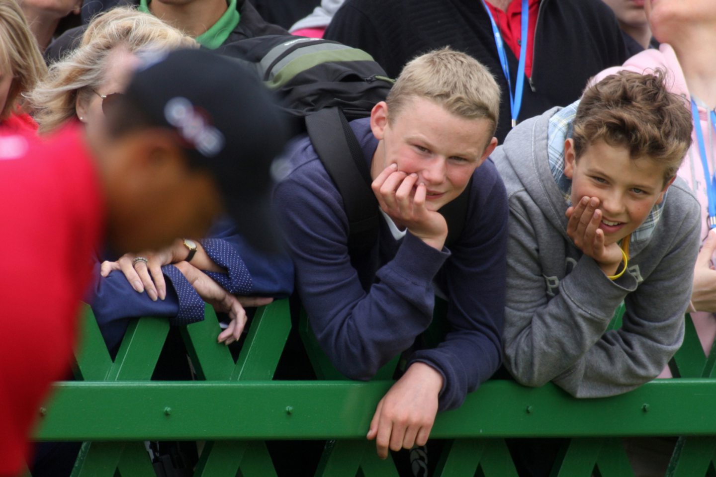 Kids in St Andrews watching Tiger Woods play golf.