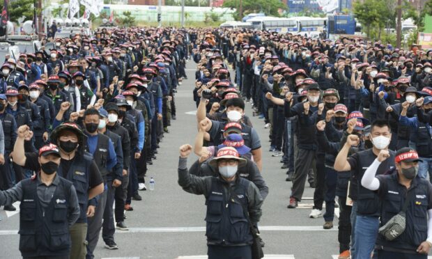 Members of the Cargo Truckers Solidarity stage a rally in Ulsan, South Korea