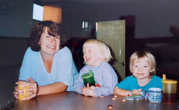 Young Florence with her sister Grace and mum Lyn.