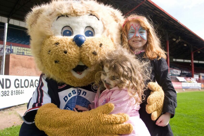 These young fans were among many who enjoyed a hug from the popular mascot through the years.