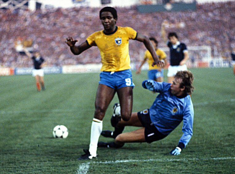Brazil's Serginho misses out to goalkeeper Alan Rough but Brazil would have the last laugh.