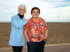 Susan and Debbie McGee on the beach (Channel 5/PA)
