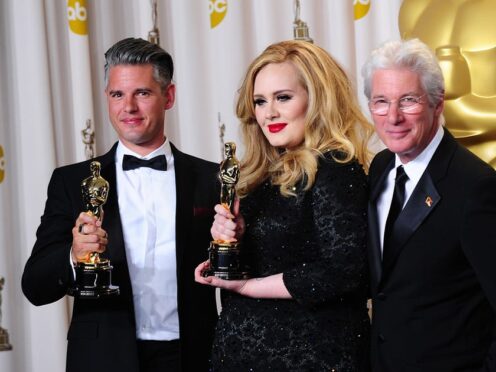 Paul Epworth (left), pictured with Adele and Richard Gere, has received another honour (Ian West/PA)