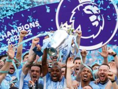 Manchester City’s Fernandinho lifts the Premier League trophy following the Premier League match at The Etihad Stadium, Manchester. Picture date: Sunday May 22, 2022.