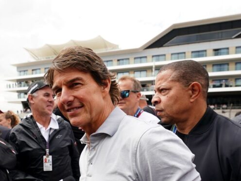 Tom Cruise on the starting grid ahead of the British Grand Prix 2022 (David Davies/PA)