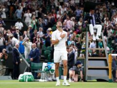 Novak Djokovic celebrates victory after his Gentlemen’s Singles fourth round match against Tim van Rijthoven during day seven of the 2022 Wimbledon Championships at the All England Lawn Tennis and Croquet Club, Wimbledon. (PA)