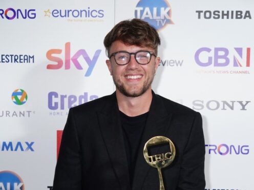 Roman Kemp with his best radio personality award at the TRIC Awards 2022 (Ian West/PA)