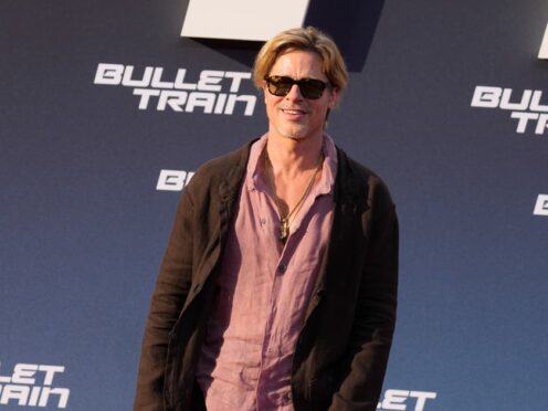 Brad Pitt swaps trousers for a skirt at Berlin red carpet event(Markus Schreiber/AP)