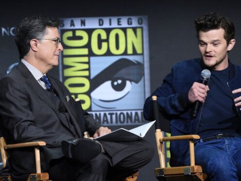 Stephen Colbert and Robert Aramayo on a Comic-Con panel (Richard Shotwell/AP)