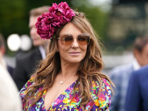 Elizabeth Hurley on day two of the Qatar Goodwood Festival 2022 at Goodwood Racecourse in Chichester (Adam Davy/PA)
