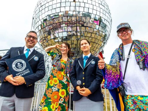 Sophie Ellis-Bextor has helped lead festival-goers at Camp Bestival to break a Guinness World Record title for the largest disco dance. (Victor Frankowski/Camp Bestival/PA)