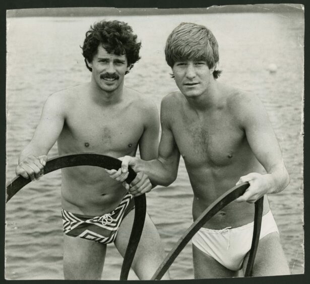Hawaii Five-0? John Holt and Richard Gough in trunks after swimming the River Tay for charity in 1982.