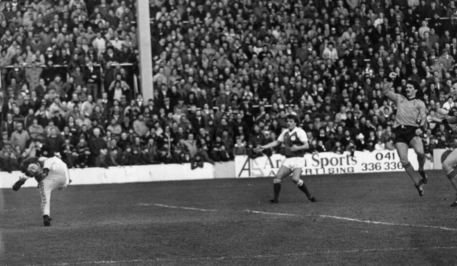 John Holt scores for Dundee United in their Scottish Cup fourth round match against Hibernian in February 1982.