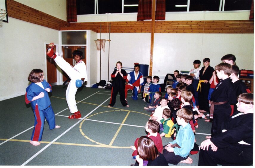 Kickboxer Doris Aboagye visited Lochee Karate Freestyle Club in March 1994.