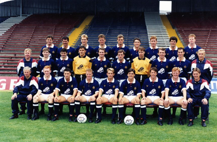 John Holt in the dark blue of United's city rivals Dundee in this squad picture from 1990-1991.