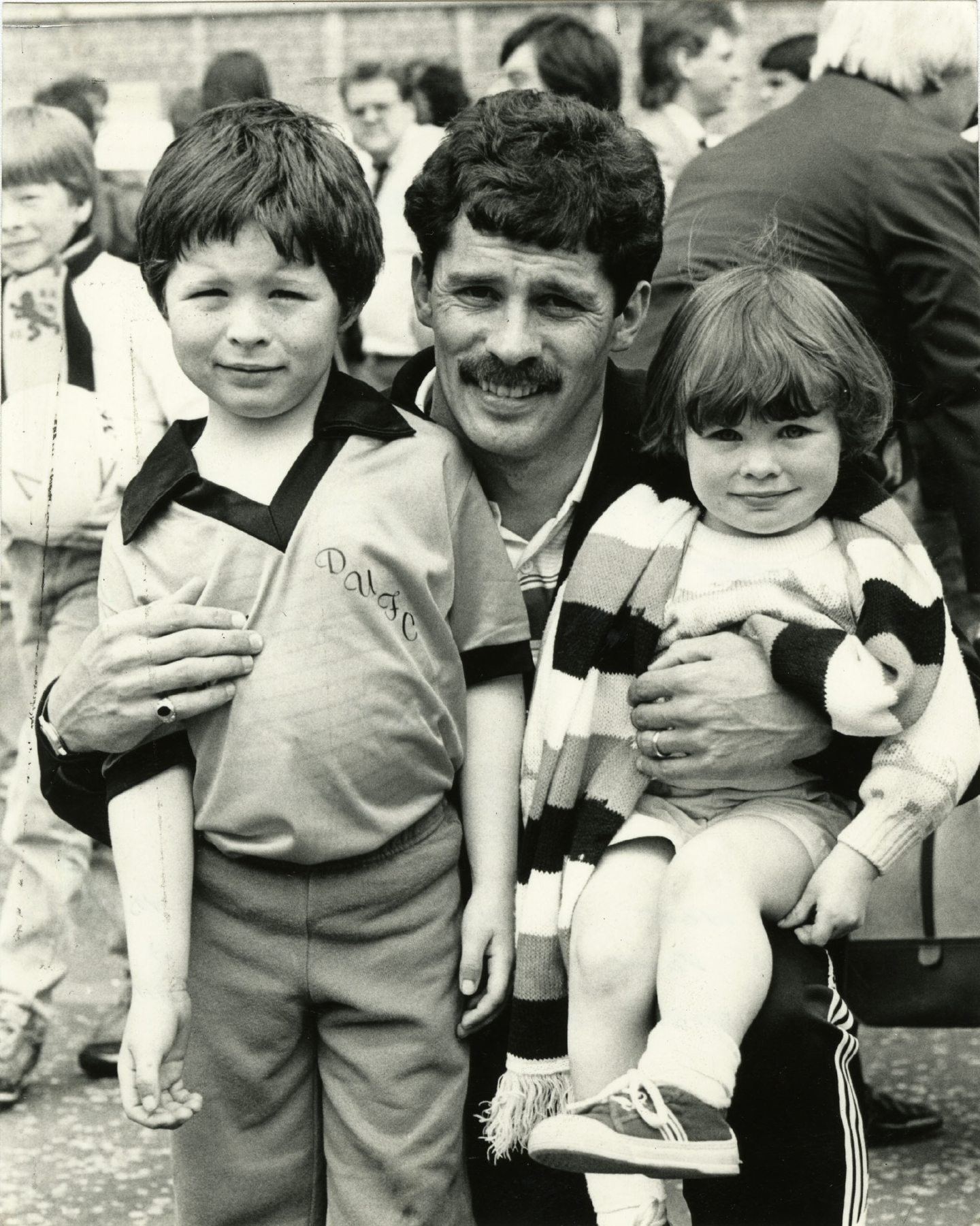 Holt with his son John and daughter Sarah following the second-leg win against Borussia Mönchengladbach in 1987.